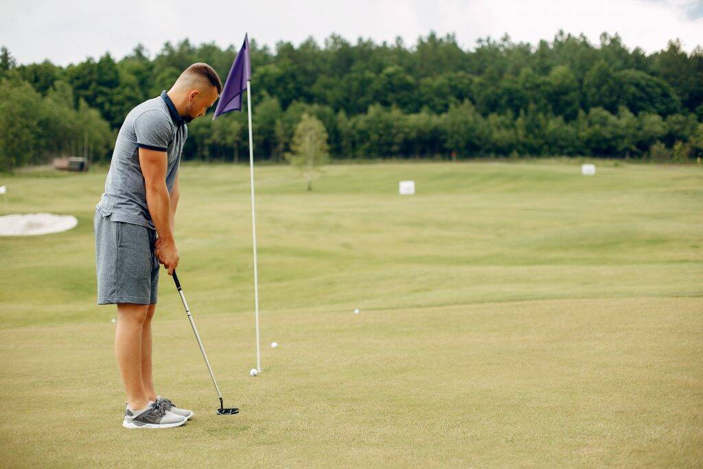 handsome-man-playing-golf-on-a-golf-course-BV38LVJ-1024x683 handsome-man-playing-golf-on-a-golf-course-BV38LVJ-1024x683
