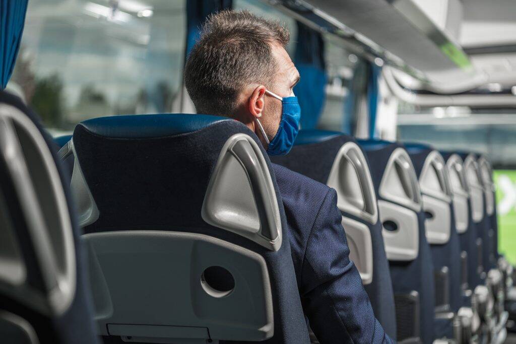 male-passenger-with-face-mask-sitting-inside-of-bu-2EB3D8L-1024x683 male-passenger-with-face-mask-sitting-inside-of-bu-2EB3D8L-1024x683