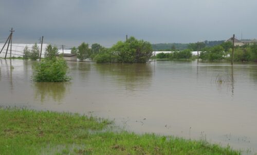 Aerial of extreme flooding on flooded field after heavy rain.