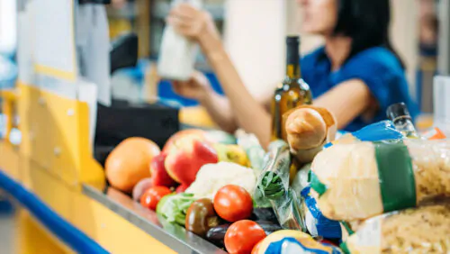 selective focus of food at cash point in supermarket