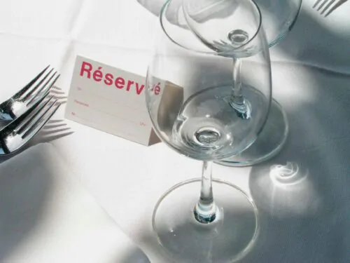 Reserved table in garden restaurant in summertime