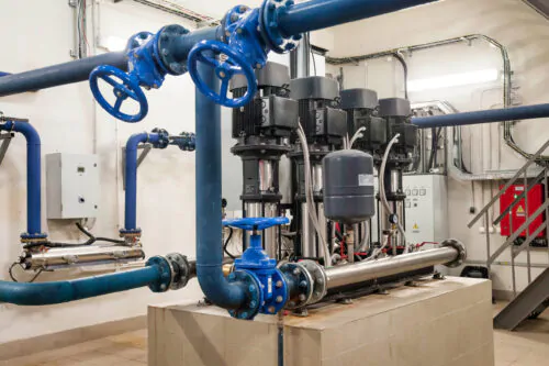Industrial interior of water pump, valves, pressure gauges